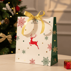 White Gift Bag with Red Reindeer and Snowflake Pattern, Elegant Holiday Design, Customizable for Gift and Retail Use