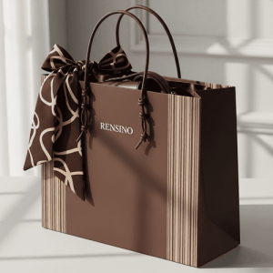 Brown Paper Gift Bag with Ribbon Handle and Decorative Bow, Suitable for Retail and Gift Packaging