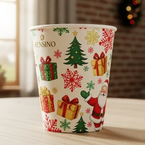 Vaso de papel con temática navideña con patrón de Santa y regalo, adecuado para empaques de vacaciones y uso promocional