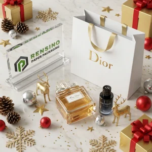 Sac en papier blanc avec impression dorée du texte “Dior” et poignées en ruban doré, adapté pour l'emballage cosmétique ou de cadeaux, service OEM/ODM disponible