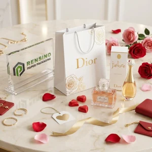 Sac cadeau en papier blanc avec logo doré et motif floral, convient pour l'emballage de cadeaux, cosmétiques ou bijoux, design personnalisé disponible