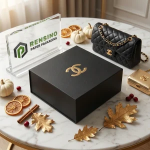 Caja de papel rígido negra con logotipo dorado adecuada para empaquetado de regalos o joyería, impresión de logotipo personalizada disponible