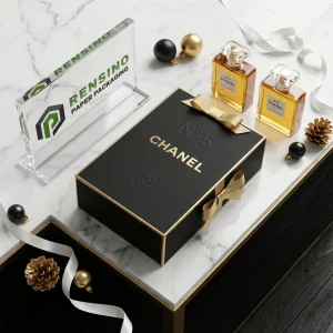 Schwarze starre Papiergeschenkbox mit goldener Schleife, geeignet für Geschenk- oder Einzelhandelsverpackungen, individueller Logo-Druck verfügbar