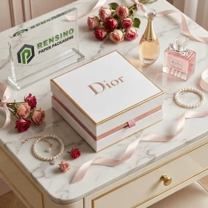 Caja de papel estilo cajón blanca y rosa de Dior con impresión en foil dorado, adecuada para empaques de regalo o joyería, servicio OEM/ODM disponible