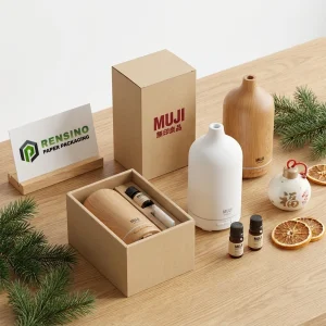 Beiger Papierkasten mit Holz- und Keramikvasen sowie ätherischen Ölen, geeignet für Geschenk-, Einzelhandels- oder Wohnkulturverpackungen, individuelle Logo-Druckoption verfügbar