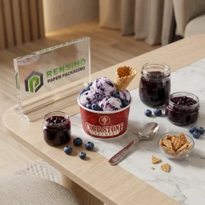 Taza de helado de papel rojo con texto impreso “COLD STONE”, adecuada para empaques de alimentos, diseño personalizado disponible