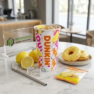 Tazza di Carta Bianca con Testo Stampato Colorato “DUNKIN” e Motivo di Cubetti di Ghiaccio al Limone, Adatta per Imballaggio di Bevande, Design Personalizzato Disponibile