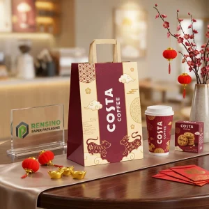 Sacs en papier alimentaire jetables bordeaux et beige avec texte stylisé imprimé et illustration de taureau pour l'emballage de café ou de biscuits, impression de logo personnalisée disponible