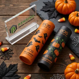 Empaque de tubo de bálsamo labial de papel naranja y negro impreso con patrón de calabaza y fantasma de Halloween, adecuado para uso cosmético o de regalo, impresión de logotipo personalizada disponible