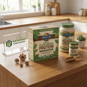 Caja de embalaje de papel verde y marrón con texto impreso “Jardín de la Vida” y patrón de hojas, adecuada para embalaje de alimentos o suplementos, servicio OEM/ODM disponible