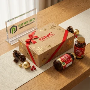 Caja de papel de regalo dorada y roja con patrón de copo de nieve, adecuada para empaque de vacaciones o regalos, servicio OEM/ODM disponible