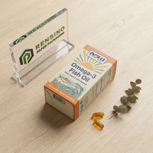 Bedruckte Papierverpackungsbox mit Fischillustration und Omega-3-Text, geeignet für Lebensmittelverpackungen, OEM/ODM-Service verfügbar