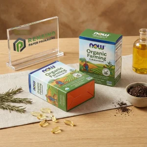 Caja de papel verde y azul con texto impreso “NOW” e ilustración agrícola, adecuada para empaques de alimentos o venta al por menor, diseño personalizado disponible