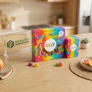 Bunte Papierbox mit gedrucktem “OLLY”-Text und abstraktem Muster, geeignet für Geschenke oder Einzelhandelsverpackungen, OEM/ODM-Service verfügbar
