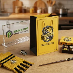 Sac en Papier Jaune et Noir avec Blason de Hufflepuff Imprimé, Convient pour l'Emballage de Cadeaux ou de Détail, Impression de Logo Personnalisé Disponible