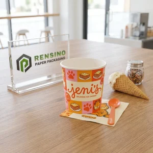 Orange and pink printed paper ice cream cups with cartoon and food designs, suitable for food packaging, customizable logo printing available.