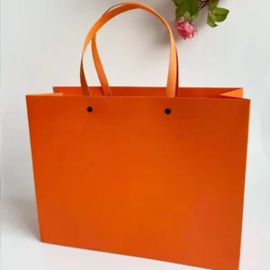 Bright Orange Paper Shopping Bag with Ribbon Handles and Custom Print for Gift Boutique Packaging