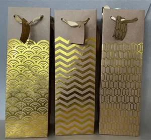 Brown Kraft Christmas Wine Gift Bag, Bottle Bag, Flexiloop Handles, Ribbon, Gold Geometric Assorted Prints