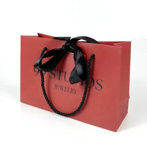 Carry Paper Bags with Bow Ribbon Handle Red Gift Shopping Bags Customized Logo Recyclable Paperbag
