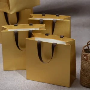 Custom Eco-Friendly Handmade Gold Paper Gift Bag with Ribbon Handle and Lamination for Candle and Wedding Gifts