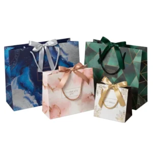 Custom Luxury Art Paper Gift Bags Ribbon Handle Eco Friendly Marble Texture Design Boutique Retail Promotion Premium Gifting Bag