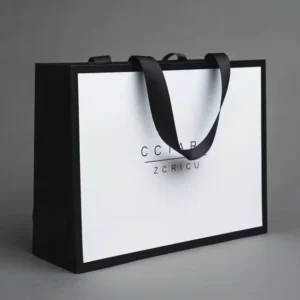 Custom White Paper Shopping Bags with Handles for Clothing Retail Packaging