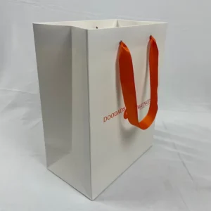 Customizable White Matte Paper Bags with Orange Logo for Fashion and Gift Packaging