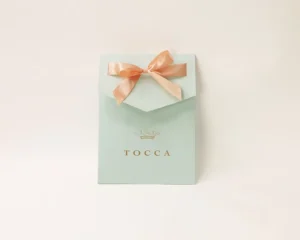 Customized Paper Purse Style Gift Bags with Folded Flap and Ribbon for Christmas Gift Packaging