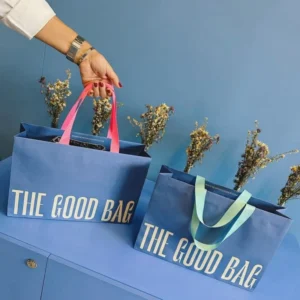 Matte Blue Gift Paper Bag with Custom Large Logo Print and Multicolor Silk Ribbon for Boutique Packaging
