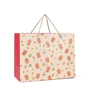 Teddy Bear and Snowman Christmas Paper Gift Bags with Gold Rope Handles and Red and Cream Festive Print
