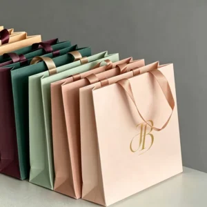 Thick White Card Paper Bag with Reinforced Handle, 6-9 kg Load Capacity, and Custom Logo Printing for Gift Packaging