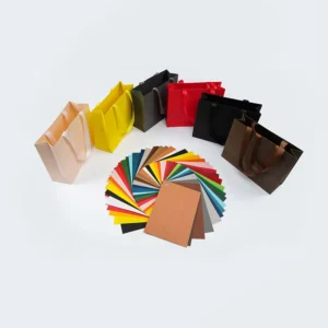 China Brown 150 250 350gsm Kraft Paper Roll Recycled Waterproof Kraft Paper Shopping Bag and Jeans Label