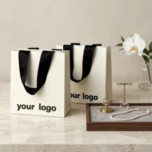 Custom Eco Friendly Luxury Cosmetics And Jewelry Shopping Gift Paper Bags Embossing Process Embossed Logo With Ribbon Handles