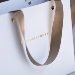 Custom Eco Friendly Paperboard Shopping Bag with Ribbon Handle Folding Structure and Hot Stamping for Gift Packaging Crafts and Candles
