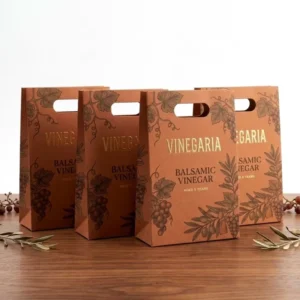 Custom Gold Foil Stamped Reinforced Kraft Paper Carrier Bag for Seasoning Vinegar Glass Bottle Packaging Solution