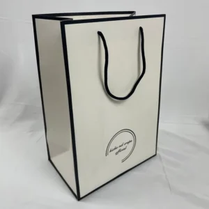 Custom Printed Paper Shopping Bags with Black Border and Handles for Fashion Brands