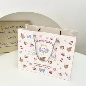 Custom White Card Paper Gift Bag Laminated Printed Shopping Bag With Rope Handle For Retail Packaging