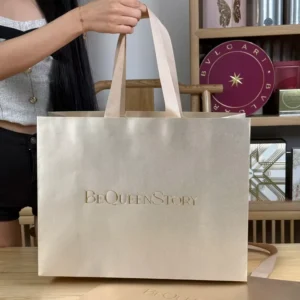 Custom White Multilayer Kraft Paper Shopping Bag with Satin Ribbon Handles and Matte Laminate Finish