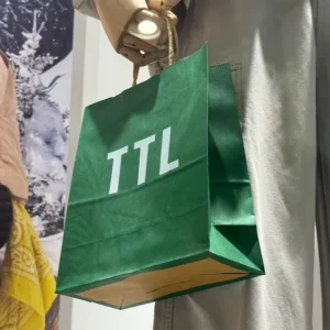 Factory Customized Dark Green Kraft Paper Bag Featuring a Crisp White Logo Perfect for Chic Shopping or Gifting