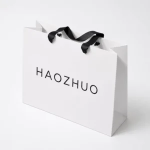 High Grade White Card Paper Shopping Bag Letter Logo Reusable Paper Gift Bag with Ribbon Handle for Cosmetic Skincare Packaging