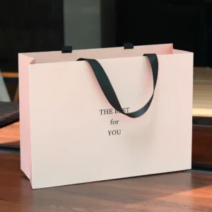 Matte Pale Pink Letter Print Paper Tote Bag with Black Ribbon Handle for Apparel and Beauty Gift Packaging