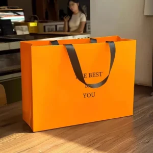 Orange Letter Print Paper Tote Bag with Black Ribbon Handle for Bakery, Apparel, and Beauty Gifts