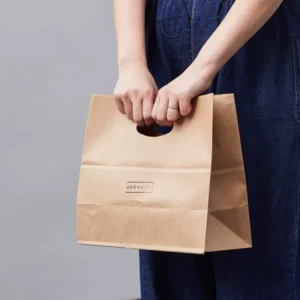 Recyclable Takeaway Kraft Paper Bags Die Cut Handles Offset Printing Custom Logo Options Food Safe Packaging for Retail Shopping