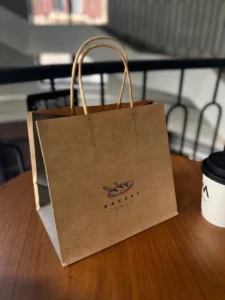 White Kraft Paper Luxury Gift Tote Bags With Ribbon Handles Custom Embossed Logo for Cosmetic Wedding Gift Packaging